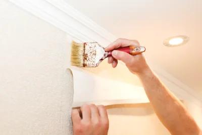 Pose de papier peint à Teloché — revêtements muraux et toiles de verre